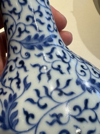 A Chinese blue and white 'lotus scroll' bottle vase, Yongzheng mark, 19/20th C.