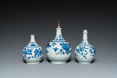 Three Japanese blue and white Arita 'birds among flowering branches' pharmacy bottles, Edo, 18th C.