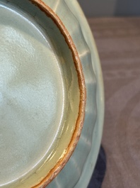 A Chinese Longquan celadon 'twin fish' plate, Yuan/Ming