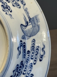 A Chinese blue and white 'Eight Immortals' dish, Xuande mark, 19th C.