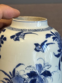 A Chinese blue and white bell-shaped water pot with birds among flowering branches, Kangxi