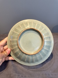 A Chinese Longquan celadon 'twin fish' plate, Yuan/Ming