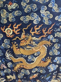 A Chinese gold thread embroidered blue-ground silk 'dragon' robe, 19th C.