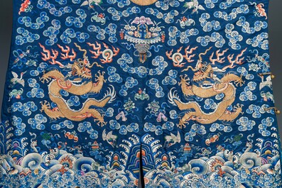 A Chinese gold thread embroidered blue-ground silk 'dragon' robe, 19th C.