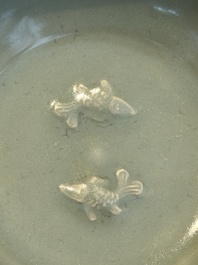 A Chinese Longquan celadon 'twin fish' plate, Yuan/Ming