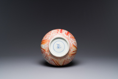 A Chinese iron-red gilt-decorated 'dragon and carp' bottle vase, 19/20th C.