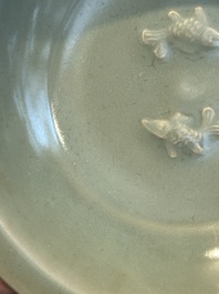 A Chinese Longquan celadon 'twin fish' plate, Yuan/Ming
