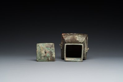 A Chinese bronze ritual wine vessel and cover, 'fang hu 方壺', Warring States Period