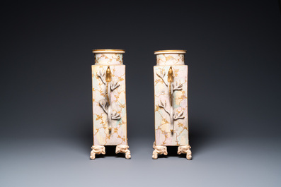 A pair of Japanese Satsuma 'Shimazu Mon' vases on elephant-form feet, Meiji, 19th C.
