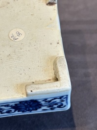 A Chinese blue and white square 'lotus scroll' box and cover, Qianlong