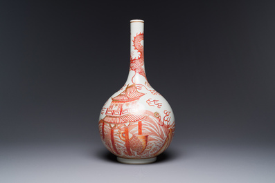 A Chinese iron-red gilt-decorated 'dragon and carp' bottle vase, 19/20th C.