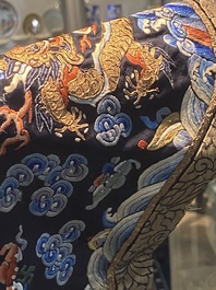 A Chinese gold thread embroidered blue-ground silk 'dragon' robe, 19th C.