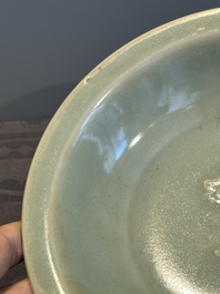A Chinese Longquan celadon 'twin fish' plate, Yuan/Ming