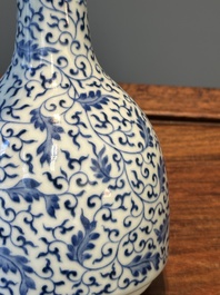A Chinese blue and white 'lotus scroll' bottle vase, Yongzheng mark, 19/20th C.