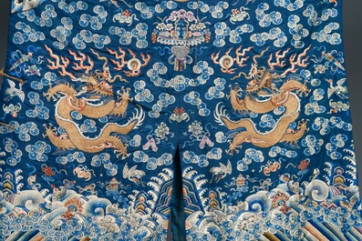 A Chinese gold thread embroidered blue-ground silk 'dragon' robe, 19th C.