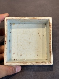 A Chinese blue and white square 'lotus scroll' box and cover, Qianlong