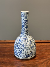 A Chinese blue and white 'lotus scroll' bottle vase, Yongzheng mark, 19/20th C.