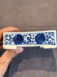 A Chinese blue and white square 'lotus scroll' box and cover, Qianlong