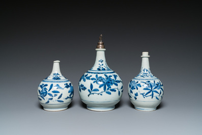 Three Japanese blue and white Arita 'birds among flowering branches' pharmacy bottles, Edo, 18th C.
