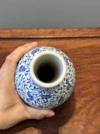 A Chinese blue and white 'lotus scroll' bottle vase, Yongzheng mark, 19/20th C.
