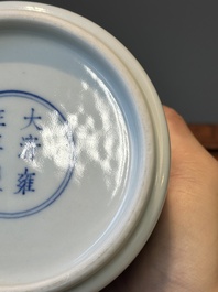 A Chinese blue and white 'lotus scroll' bottle vase, Yongzheng mark, 19/20th C.