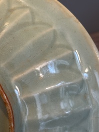 A Chinese Longquan celadon 'twin fish' plate, Yuan/Ming