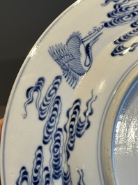 A Chinese blue and white 'Eight Immortals' dish, Xuande mark, 19th C.