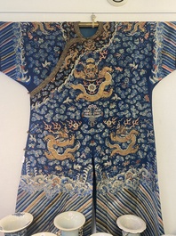 A Chinese gold thread embroidered blue-ground silk 'dragon' robe, 19th C.