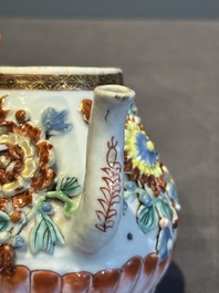 A Chinese famille rose teapot and stand with floral relief design, Qianlong