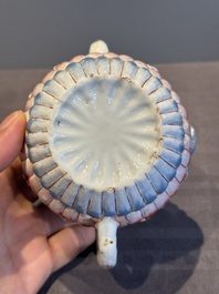 A Chinese famille rose teapot and stand with floral relief design, Qianlong
