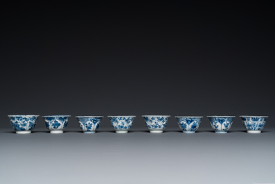 Twelve Chinese blue and white saucers and eight cups, Kangxi/Yongzheng