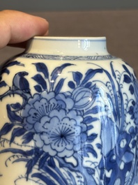 A Chinese blue and white bell-shaped water pot with birds among flowering branches, Kangxi