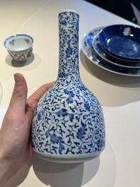 A Chinese blue and white 'lotus scroll' bottle vase, Yongzheng mark, 19/20th C.