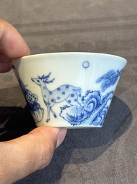 Two Chinese blue and white cups and three saucers with figural design, Kangxi and later