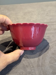 A pair of Chinese ruby-glazed bowls, Qianlong mark, 19/20th C.