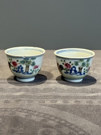 A pair of Chinese famille rose 'chicken' cups, Qianlong mark and of the period