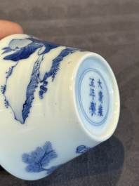 Two Chinese blue and white cups and three saucers with figural design, Kangxi and later