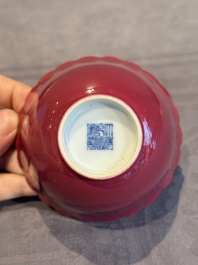 A pair of Chinese ruby-glazed bowls, Qianlong mark, 19/20th C.