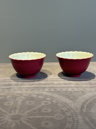 A pair of Chinese ruby-glazed bowls, Qianlong mark, 19/20th C.