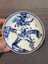 Two Chinese blue and white cups and three saucers with figural design, Kangxi and later
