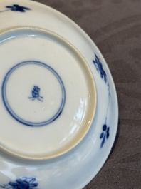 Two Chinese blue and white cups and three saucers with figural design, Kangxi and later