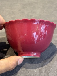A pair of Chinese ruby-glazed bowls, Qianlong mark, 19/20th C.
