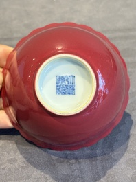 A pair of Chinese ruby-glazed bowls, Qianlong mark, 19/20th C.