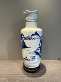 A Chinese blue and white rouleau vase with fishermen in a landscape, Kangxi