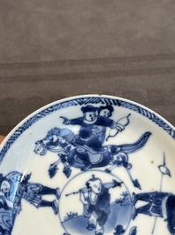 Two Chinese blue and white cups and three saucers with figural design, Kangxi and later