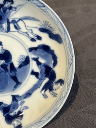 Two Chinese blue and white cups and three saucers with figural design, Kangxi and later