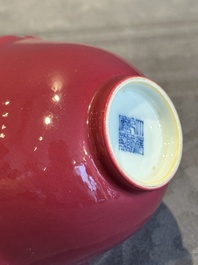 A pair of Chinese ruby-glazed bowls, Qianlong mark, 19/20th C.