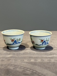 A pair of Chinese famille rose 'chicken' cups, Qianlong mark and of the period