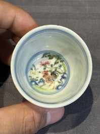 A pair of Chinese famille rose 'chicken' cups, Qianlong mark and of the period