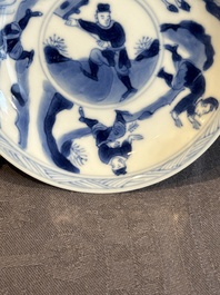 Two Chinese blue and white cups and three saucers with figural design, Kangxi and later